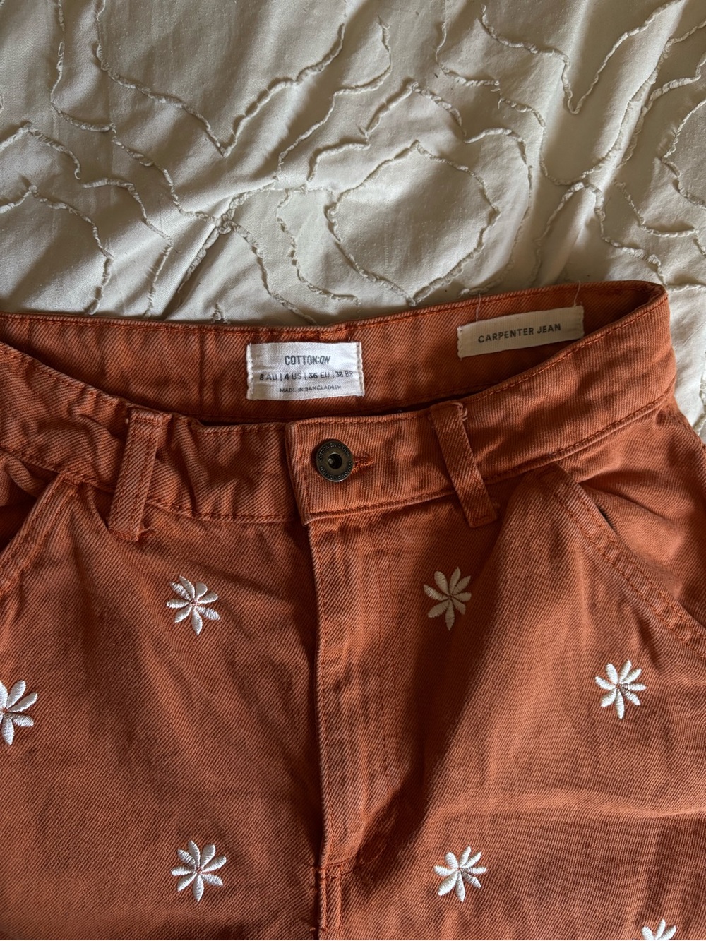 Cotton On High-Rise Carpenter Jeans in Rust Orange with Embroidered Flowers